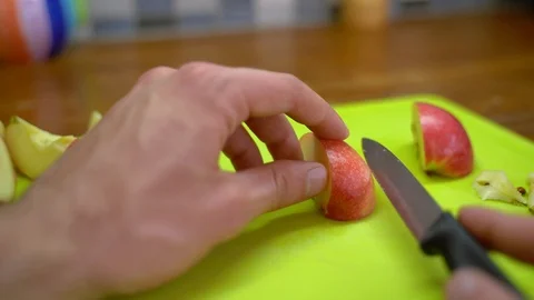 Cutting Apple Slices Stock Footage 92858795