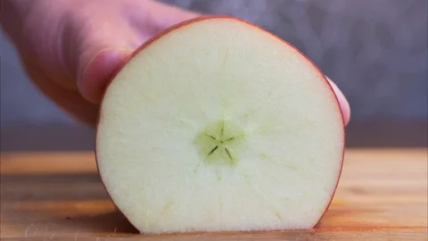 Cutting Apple into Slices Stop Motion Animation Video stock 115987966