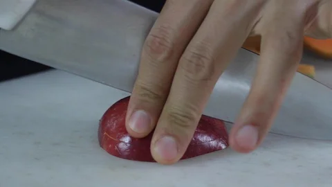 Cutting apple into small squares Stock Footage 130061642