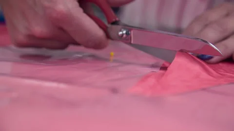 Cutting around measured textile for sewing dress Stock Footage 41013333