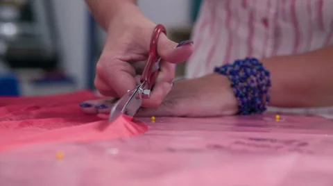 Cutting around plastic foil close up Stock Footage 41013452