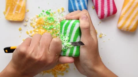 Cutting ASMR soap with a thin stationery knife .Cutting soap into pieces squares Vídeos de archivo 254633306
