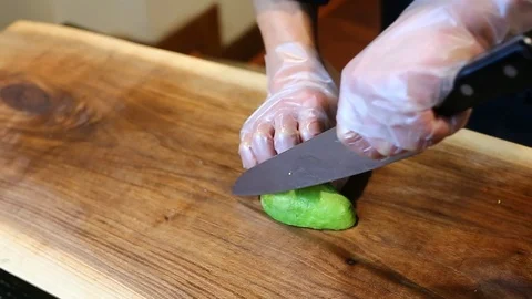 CUTTING AVOCADO Stock Footage 85664210