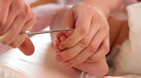 Cutting baby nails. Video stock 1087852