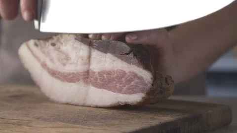 Cutting bacon, camera moves right to left Stock Footage 89935864