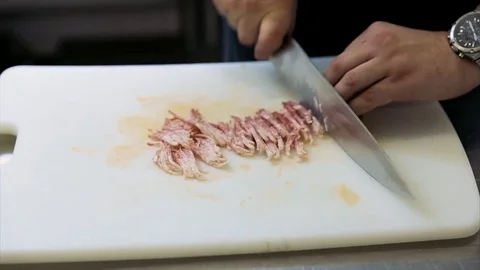 Cutting a bacon with a knife Stock Footage 77480687