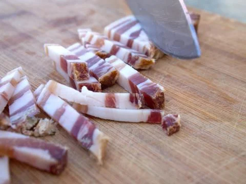 Cutting bacon Stock Photos