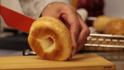 Cutting Bagels Stock Footage