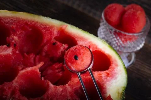 Cutting balls from watermelon. Stock Photos