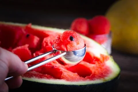 Cutting balls from watermelon. Stock Photos