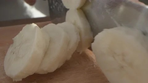 Cutting Banana (2) Stock Footage 157884973