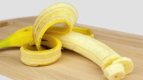 Cutting bananas close-up time-lapse Stock Footage 82844779