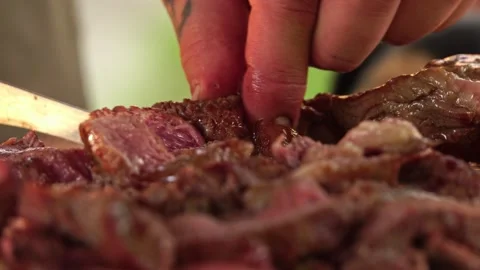 Cutting barbecue steak fried on the grill Stock-Footage 245478037