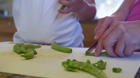 Cutting up beans Stock Footage 62282012