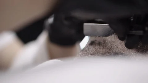 Cutting a beard with a blade Stock Footage 88445908