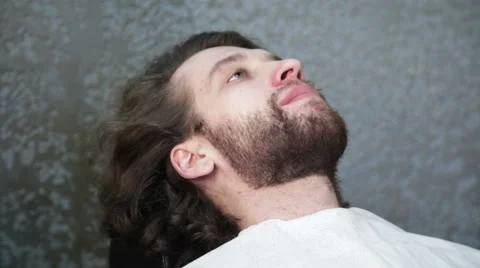 Cutting  beard with the scissors and the comb Stock Footage 62980325