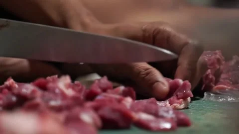 Cutting beef from close up view Stock Footage 270347158