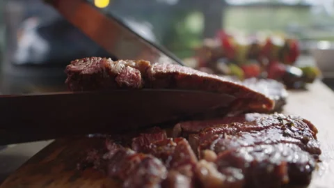 Cutting Beef Steak Grilled on BBQ Stock Footage 227594343