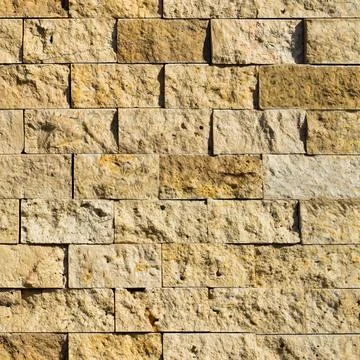 Cutting beige marble wall rectangular, seamless lined up Stock Photos