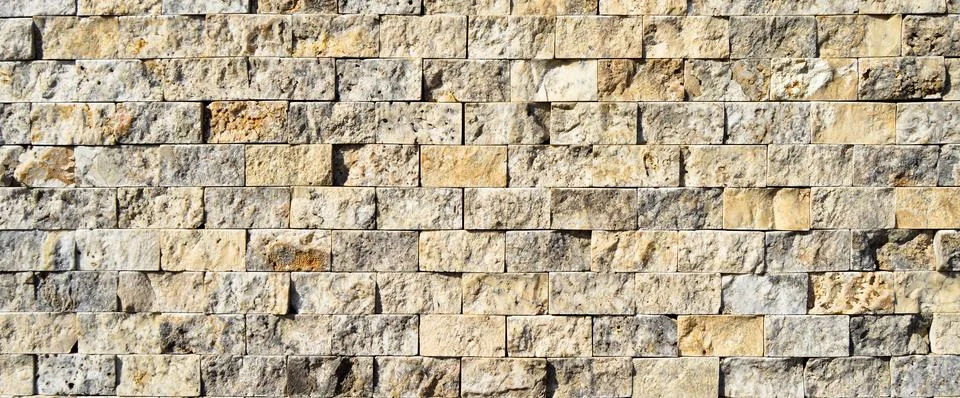 Cutting beige marble wall rectangular, seamless lined up Stock Photos