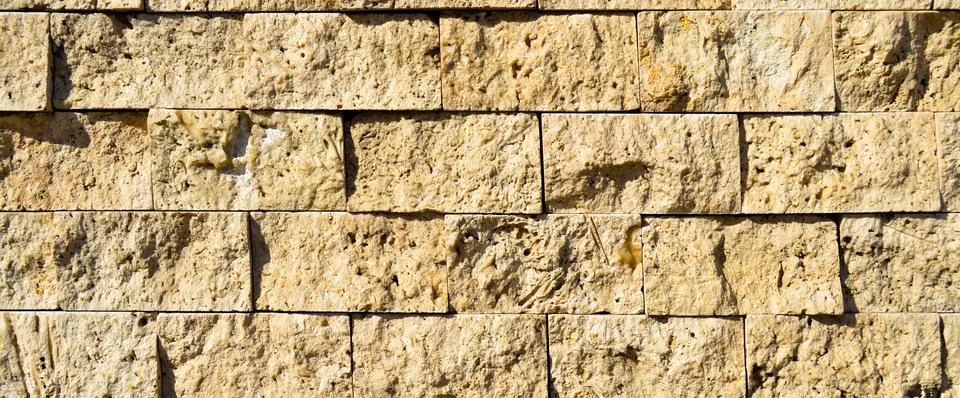 Cutting beige marble wall rectangular, seamless lined up Stock Photos