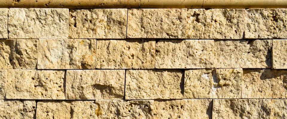 Cutting beige marble wall rectangular, seamless lined up Stock Photos