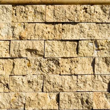 Cutting beige marble wall rectangular, seamless lined up Stock Photos