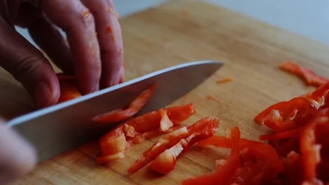 Cutting bell pepper on a cutting board. Frozen vegetables. salad. Stock Footage 118922463