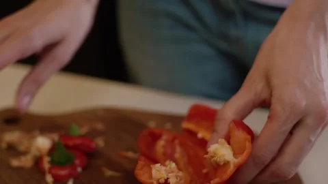 Cutting Bell Pepper. Series - making tortilla with chicken and bell pepper. Video stock 154888844