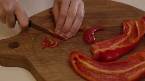 Cutting Bell Pepper. Series - making tortilla with chicken and bell pepper. Stock Footage 154888850