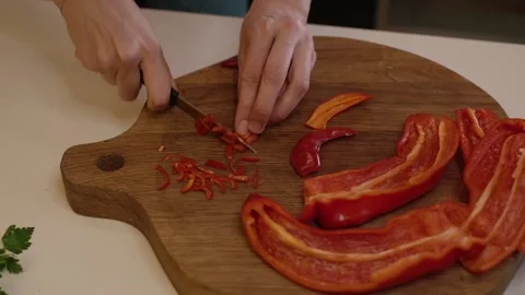 Cutting Bell Pepper. Series - making tortilla with chicken and bell pepper. Stock-Footage 154888858
