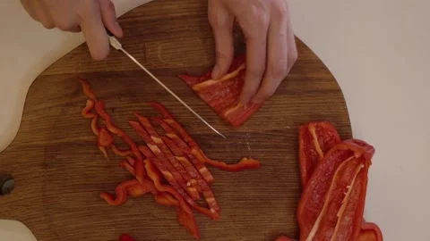 Cutting Bell Pepper. Series - making tortilla with chicken and bell pepper. Stock Footage 154888872