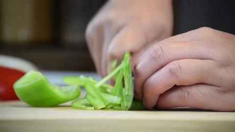 Cutting bell pepper into small pieces Video stock 160044436