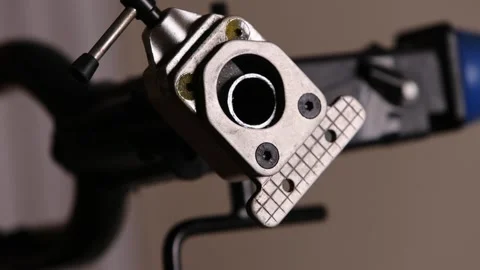 Cutting a bicycle fork metal steerer tube with a hacksaw blade close up Stock Footage 307453438