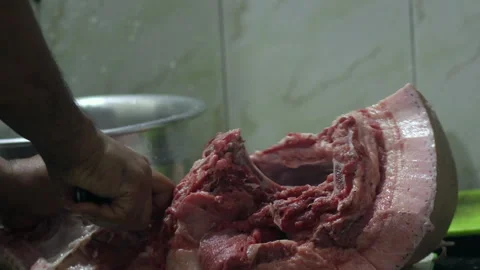Cutting a big piece of fresh raw pork meat Stock Footage 279066592