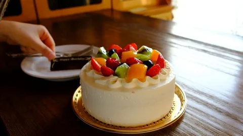 Cutting of birthday cake Stock Footage 81541573