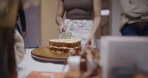 Cutting Birthday Cake Stock Footage 324765405