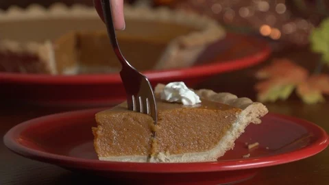Cutting a bite of pie with fork Stock Footage 96553590