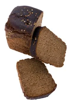 Cutting black bread close up Stock Photos