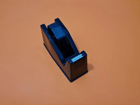 Cutting black plastic insulation Stock Photos