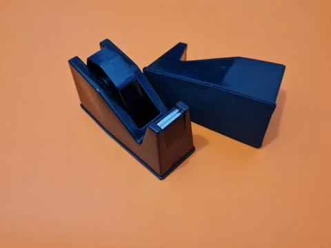 Cutting black plastic insulation Stock Photos