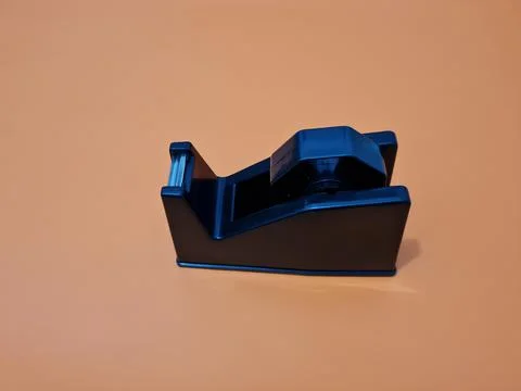 Cutting black plastic insulation Stock Photos