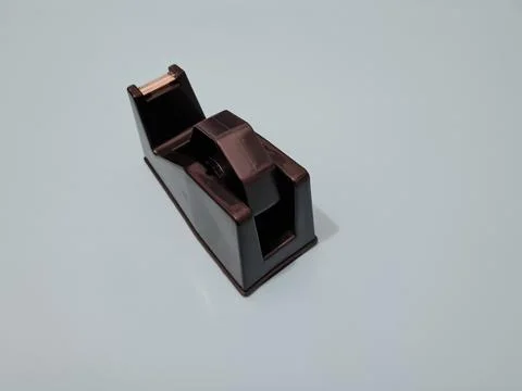 Cutting black plastic insulation Stock Photos