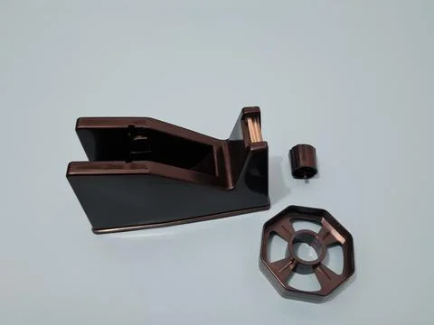 Cutting black plastic insulation Stock Photos