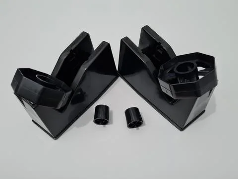 Cutting black plastic insulation Foto stock