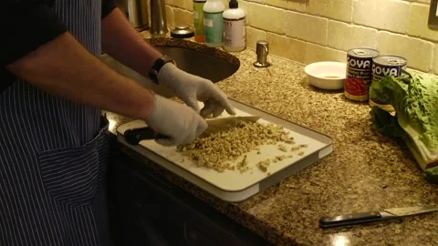  Cutting a block of tempeh into small pieces  Vídeos de archivo 143720068