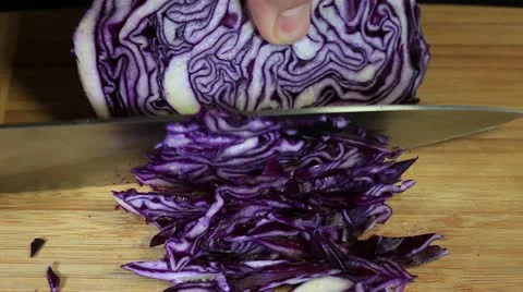 Cutting the blue cabbage Stock Footage 10869741
