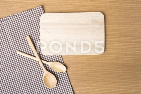 Cutting Board And Wooden Spoon