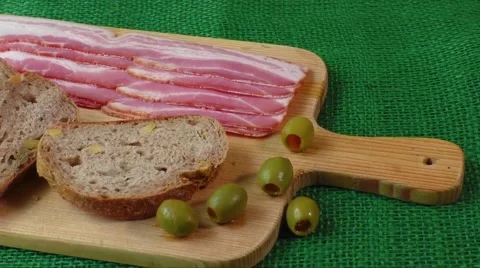 Cutting board with bacon and bread Stock Footage 59883783
