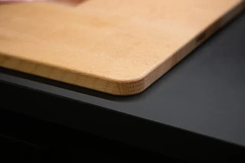 Cutting Board on the kitchen table close-up Stock Photos